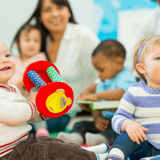 Moms and babies socialize at a playdate.