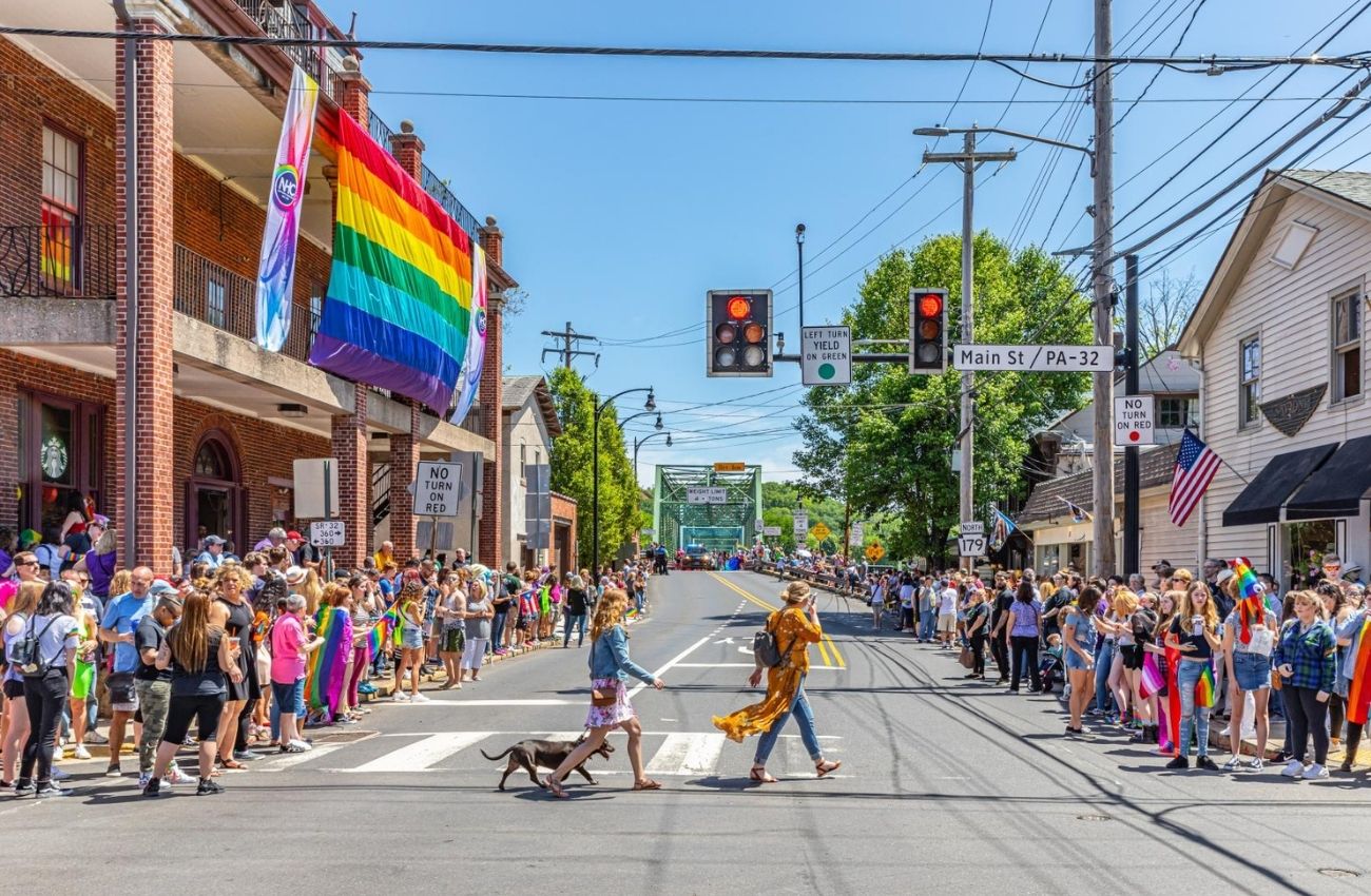 A Pride celebration with rainbow flag on the street in New Hope, PA.