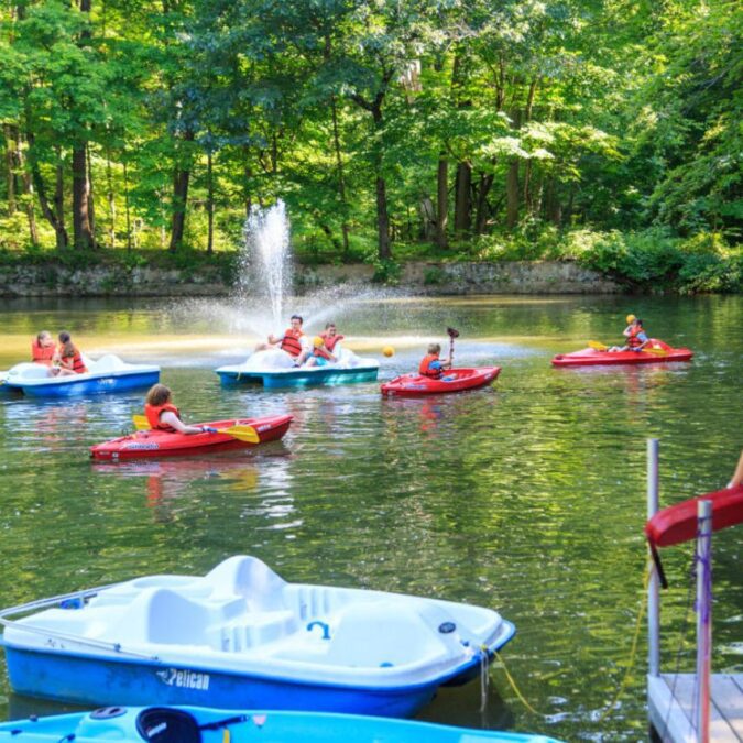 Campers enjoy paddleboats and kayaks on Diamond Lake at Diamond Ridge Camps in Warminster.