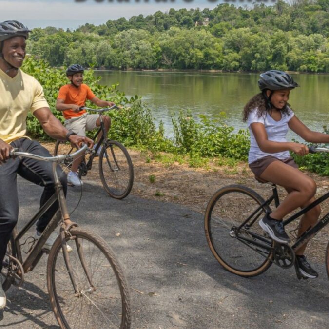 A father and two kids rides bikes along the Delaware Canal Towpath in Bucks County.