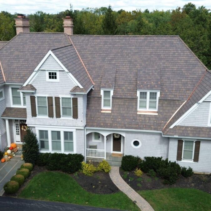 A roofing of composite materials that looks like slate by O'Donnell Roofing.