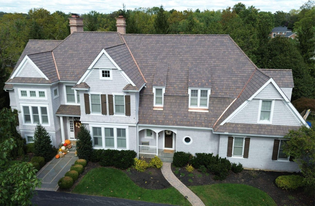 A roofing of composite materials that looks like slate by O'Donnell Roofing.