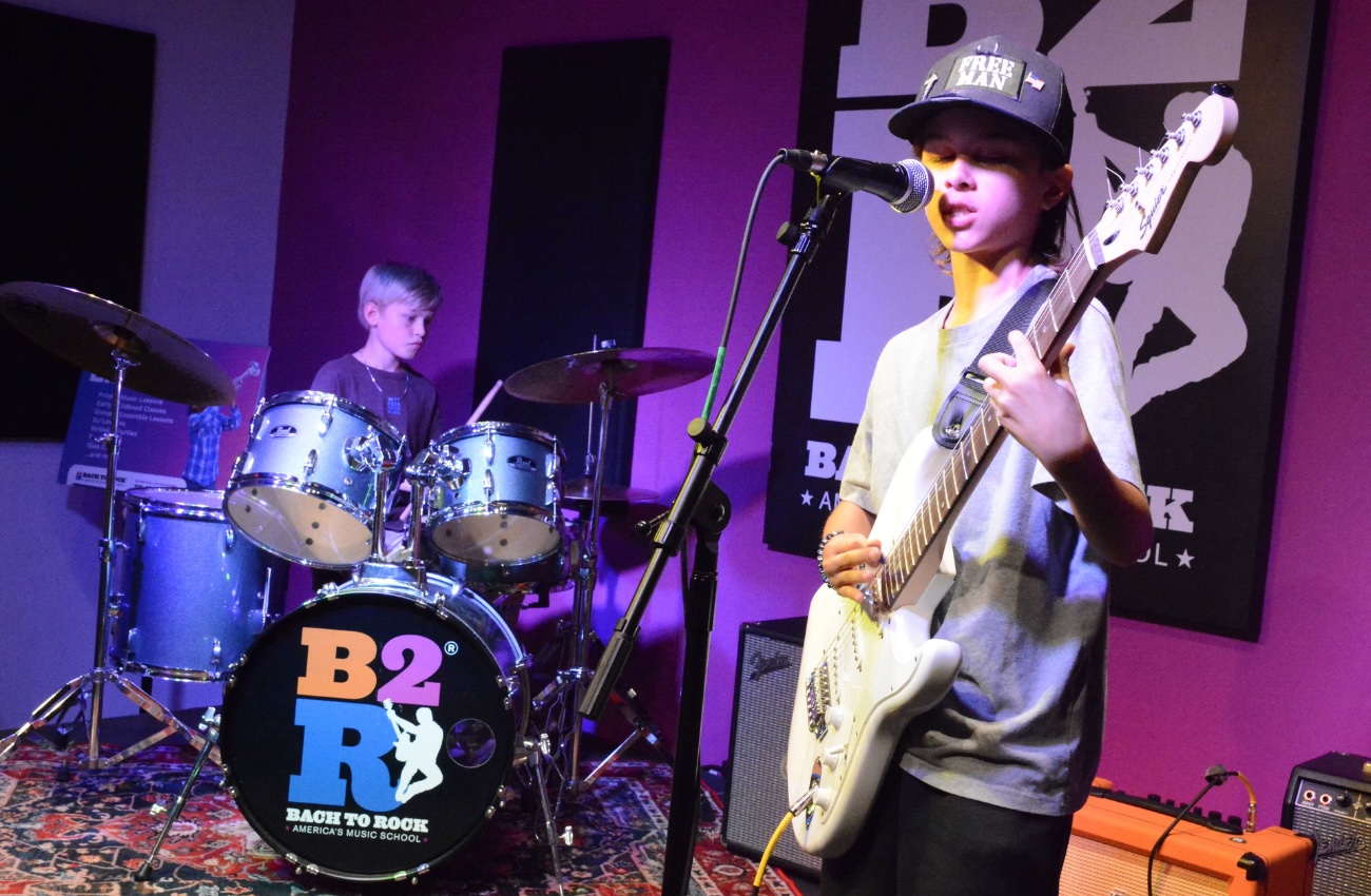 Kids play in a band at Bach to Rock Warminster in Warminster, PA
